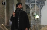 Capture d'écran d'une vidéo de propagande diffusée le 5 juillet 2014 lors d'une adresse présumée du chef du groupe Etat islamique (EI), Abou Bakr al-Baghdadi, dans une mosquée de Mossoul, dans le nord de l'Irak