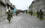 Des militaires en patrouille dans un quartier du sud de Quito, le 12 janvier 2024 en Equateur