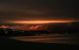 L'incendie fait rage au petit matin près de la dune du Pilat à La Teste de Buch, en Gironde, le 18 juillet 2022