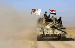 Des soldats irakiens aidés par des unités chiites avancent vers Tal Afar, le 20 août 2017