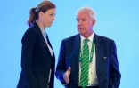 L'ancienne escrimeuse allemande Claudia Bokel et le président de l'agence anti-dopage Craig Reedie le 2 août 2016 à Rio