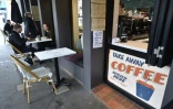 Des personnes à la terrasse d'un café, le 15 mai 2020 à Sydney, en Australie