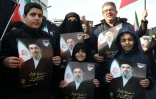 Des manifestants tiennent des portraits du nouveau guide suprême l'ayatollah Mojtaba Khamenei à Téhéran, le 9 mars.
