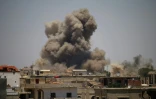 Bombardements aériens de l'armée syrienne visant la localité de Basr al-Harir dans la province méridionale de Deraa le 24 juin 2018