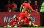 Les joueurs anglais exultent sur le 2e but d'Harry kane face à la Tunisie lors du Mondial, le 18 juin 2018 à Volgograd