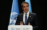 Le Premier ministre grec Kyriakos Mitsotakis à la tribune de la COP29, le 13 novembre 2024 à Bakou, en Azerbaïdjan