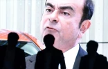 Le visage du président de Nissan, Carlos Ghosn, sur un grand écran à Tokyo le 20 novembre 2018.