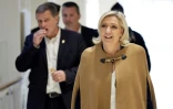 La cheffe de file du Rassemblement National (RN) Marine Le Pen arrive avec le premier vice-président du RN et maire de Perpignan Louis Aliot au tribunal de Paris, le 5 novembre 2024