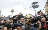 Le président nationaliste du Conseil exécutif Gilles Simeoni (c)lors d'une manifestation à Ajaccio, le 3 février 2018 en Corse