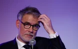 Le premier secrétaire du PS Olivier Faure, lors d'un meeting du Front populaire 2027, à Paris, le 5 mai 2027