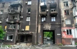 Un immeuble résidentiel qui a brûlé à Marioupol, le 18 mai 2022 en Ukraine