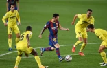 La star du Barça Lionel Messi défie la défense de Villarreal au Camp Nou, le 27 septembre 2020