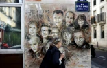 Sur un mur parisien, les victimes de l'attentat de Charlie Hebdo peintes par l'artiste Christian Guemy, alias C215, photographiées le 31 août 2020