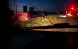 Une image tirée d'une vidéo récupérée sur le téléphone portable d'un secouriste tué à Rafah dans le sud de Gaza selon le Croissant-Rouge palestinien le 5 avril 2025, montre un camion de pompiers et des secouristes se diriger vers un véhicule en bord de route à Rafah