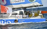 Le skipper Kito de Pavant à la barre du "Bastide Ostio" avant le départ du Vendée Globe, le 6 novembre 2016 aux Sables d'Olonne   