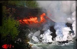 14 janvier 2002, la lave traverse la route nationale 2 reliant Sainte-Rose (Est) à Saint-Philipe (Sud) et se jete dans la mer