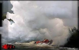 14 janvier 2002, la lave traverse la route nationale 2 reliant Sainte-Rose (Est) à Saint-Philipe (Sud) et se jete dans la mer