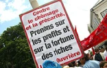 Environ 15 000 personnes ont manifesté à Saint-Denis à l'occasion de la fête du 1er mai 2003. C'est la première fois que la célébration d'un 1er mai rassemble autant de monde à La Réunion