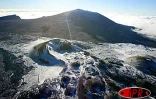 Dimanche 3 août 2003
Spectacle exceptionnel du volcan et du Piton des Neiges sous la neige glacée
