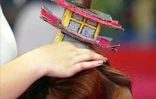 Le dimanche 21 juillet 2002 au Port (Ouest) lors Trophée 2002 de la coiffure organisé par le syndicat départemental des professionnels de la coiffure