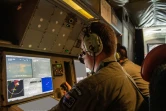 L'équipage d'un avion de reconnaissance Orion des forces néo-zélandaises surveillent la zone des îles Tonga après l'éruption du volcan Hunga-Tonga-Hunga-Ha'apai, le 17 janvier 2022