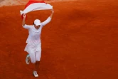 La joie de la Polonaise Iga Swiatek après sa victoire en finale de Roland-Garros face à l'Américaine Sofia Kenin, le 10 octobre 2020