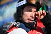 L'Américain Shaun White, en pleurs après son dernier run en finale du half-pipe aux Jeux olympiques de Pékin, le 11 février 2022 à Zhangjiakou