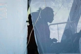 Des malades souffrant de diarrhées sont traités dans une tente le 27 mars 2019 à Beira, au Mozambique. Plus de mille cas de choléra ont été signalés