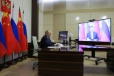 Le président russe Vladimir Poutine en visioconférence avec son homologue chinois Xi Jinping le 21 janvier 2025