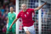 La joie de l'attaquant norvégien Erling Haaland, après avoir marqué le 2e but sur pénalty face à la Suède, lors de leur match de Ligue des nations, le 12 juin 2022 à Oslo