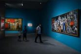 Des visiteurs parcourent l'exposition "l'Unité fait la force" dédiée au combat de la Chine contre le Covid-19, présentée au musée national de Chine à Pékin, le 5 août 2020