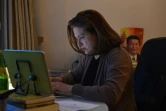 Ursula Gauthier, correspondante à Pékin pour L'Obs, travaille dans son bureau le 26 décembre 2015 à Pékin