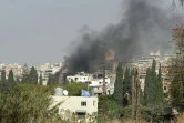 Une colonne de fumée s'élève du site d'une frappe aérienne israélienne qui a ciblé un secteur proche de la ville de Saïda, dans le sud du Liban, le 27 octobre 2024