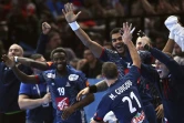 Les handballeurs français célébrant leur victoire lors du Mondial-2017 après un succès en finale contre la Norvège, le 29 janvier 2017 à Paris