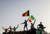 Des sympathisants du candidat antisystème à la présidentielle  Bassirou Diomaye Faye, lors d'un rassemblement à Mbour, le 22 mars 2024 au Sénégal