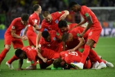 La joie de l'équipe d'Angleterre après sa victoire lors de la séance de tirs au but sur la Colombie, à Moscou, le 3 juillet 2018