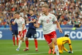 La défense des Bleus concède un but contre le Danemark, oeuvre d'Andreas Cornelius au Stade de France, le 3 juin 2022 