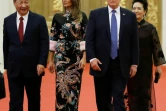 Donald Trump, son épouse  Melania Trump, en compagnie de Xi Jinping et de son épouse Peng Liyuan arrivent au dîner d'Etat servi au Palais du Peuple à Pékin, le 9 novembre 2017