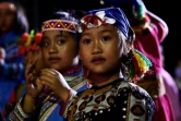 De jeunes aborigènes Bunun en habits traditionnels lors d'une fête dans le village de Chishang, à Taïwan, le 30 avril 2021