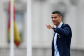 L'attaquant portugais du Real Madrid Cristiano Ronaldo fête la 3e victoire finale du Real Madrid en Ligue des champions à Kiev 