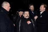 Patrice Clos (au centre avec une moustache), à Paris le 22 janvier 2015