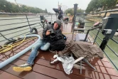Le photographe de l'Agence France-Presse Emmanuel Dunand avant la cérémonie d'ouverture des JO, le 26 juillet 2024 à Paris