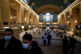 Des personnes portent un masque de protection à la gare Grand Central, le 9 février 2022 à New York