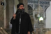 Image tirée d'une vidéo de propagande de l'EI montrant le 5 juillet 2014 le chef de l'EI Abou Bakr al-Baghdadi s'adressant à des fidèles dans une mosquée de Mossoul, en Irak