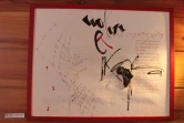 ?uvres de calligraphie latine de Nadia Akhoun exposées au restaurant &quot;Le Zamalac&quot; à Saint-Paul