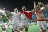 Les joueurs danois célébrant leur qualification pour les demi-finales de l'Euro après leur victoire 2-1 contre la République tchèque, le 3 juillet 2021 à Bakou.