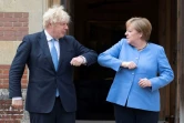 Le Premier ministre britannique Boris Johnson accueille la chancelière allemande Angela Merkel arrivée en visite officielle à Chequers, le 2 juillet 2021