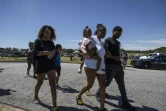 Des familles près du lycée Apalachee de la ville de Winder, dans l'Etat américain de Géorgie, après des tirs, le 4 septembre 2024