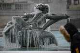 Une statue de sirène gelée, sur une fontaine de Trafalgar Square à Londres (Royaume-Uni) le 9 février 2021.