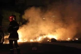 Le Port - Mercredi 22 février 2012 - Des émeutiers ont mis le feu à des voitures à l'intérieur de la concession Peugeot (Photo D.R)